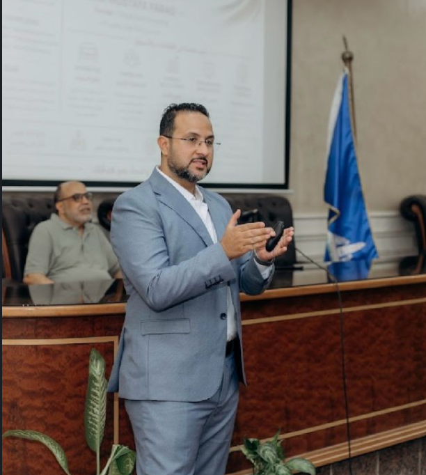 Mustafa Farag delivering a speaking engagement at a professional conference