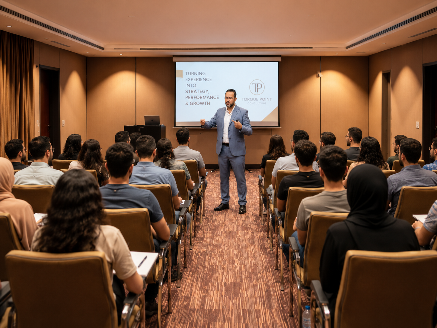 Mustafa Farag leading a corporate training seminar